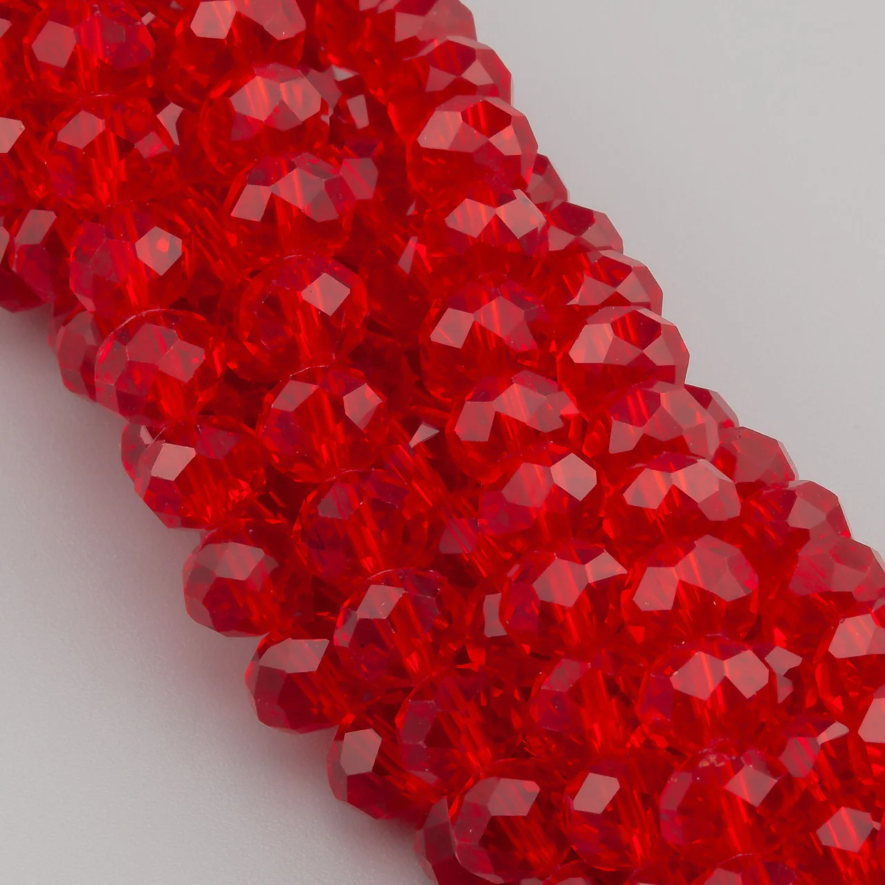 Намистини Swarovski огранювання рондель 6х4,8 мм Ø 1 мм ±39 см (±82 шт.) Червоний прозорий