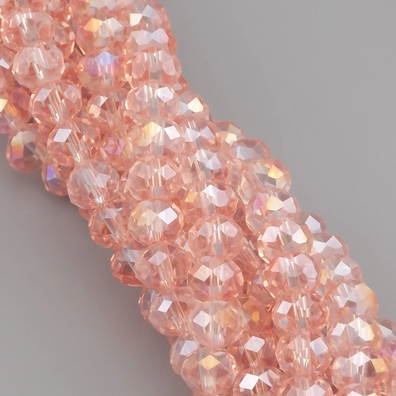 Бусины Swarovski огранка рондель 6х4,8 мм Ø 1 мм ±39 см (±82 шт.) Пудровый АВ прозрачный