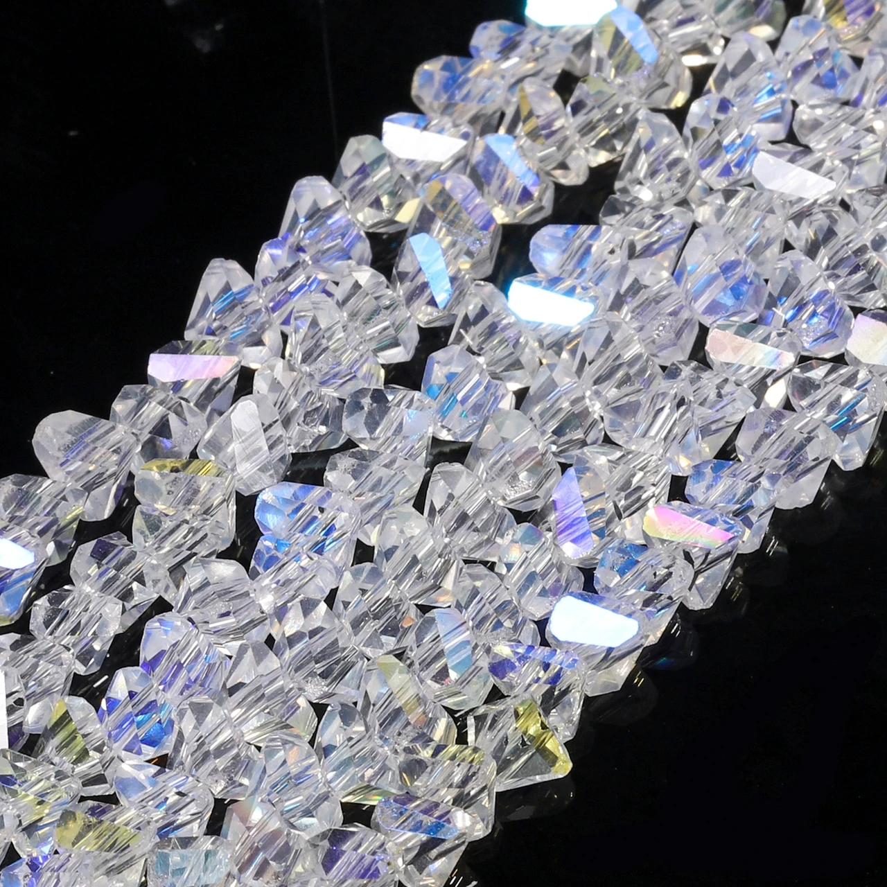 Намистини Swarovski огранювання трикутник 6 мм Ø 1 мм 30 см (+-85 шт.) Прозорий АВ