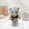 Игрушка-брелок Медвежонок люрекс 12х6 см 1 шт. Серебристый