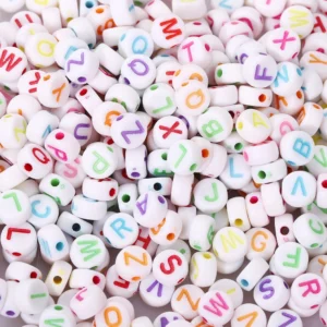 Намистини таблетка алфавіт ABC 7х4 мм +-25 г (+-190 шт.) Білий літери Різних кольорів