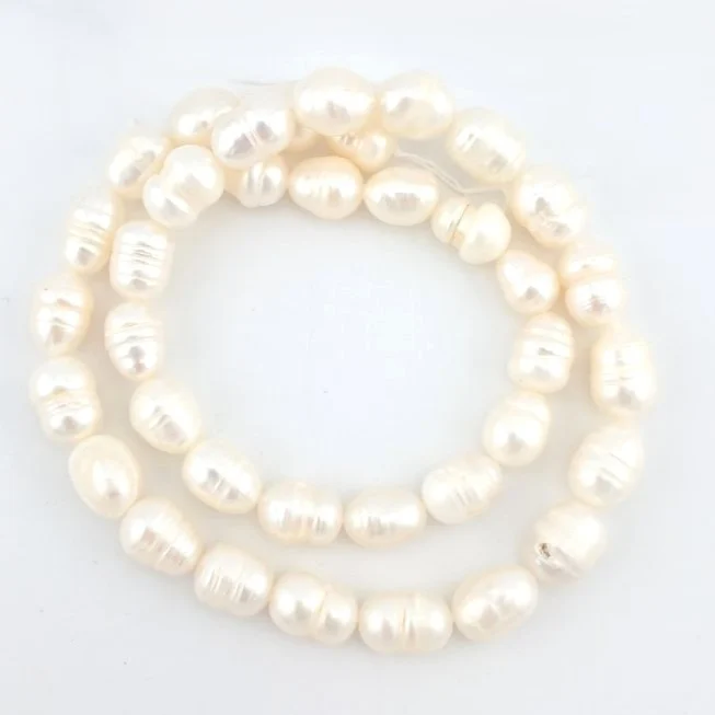 Перлини Ovalé Ivory Pearls 6-7 мм ±34 см 26 шт. Кремовий